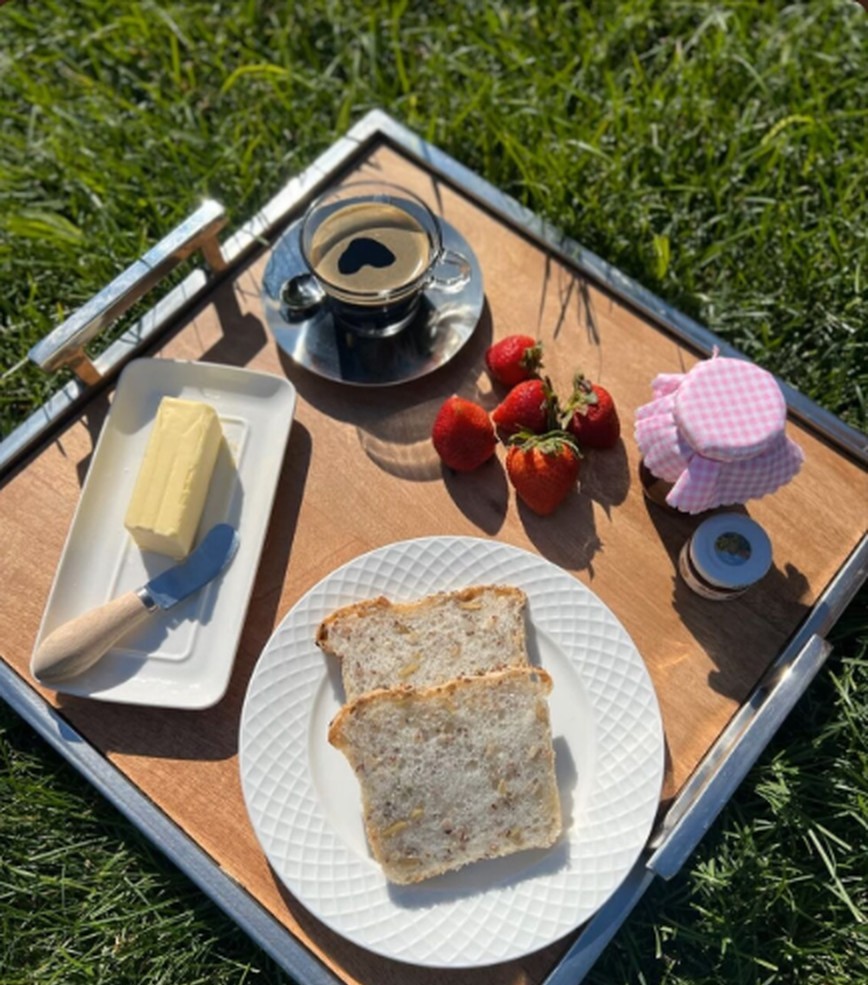 Garden breakfast tray with toast, jam and coffee
