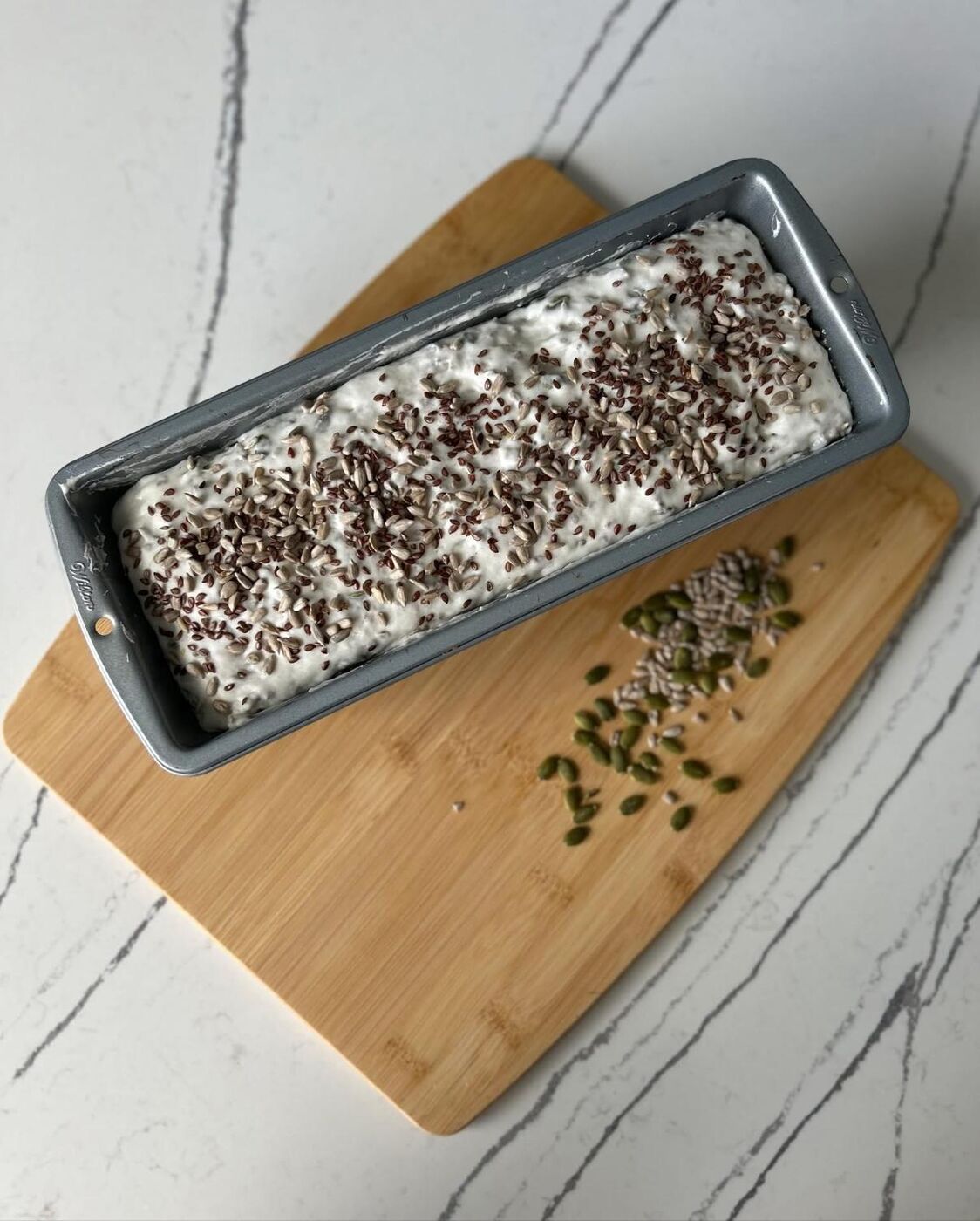 Dough resting in the pan before baking
