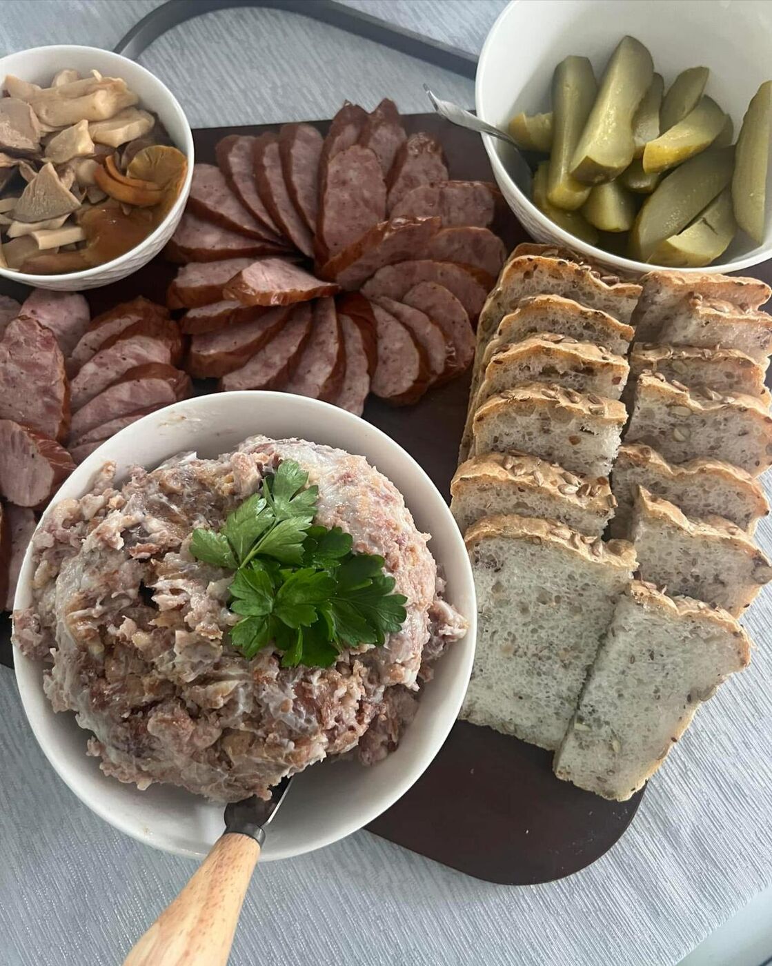 A table spread of gluten-free breads and bagels